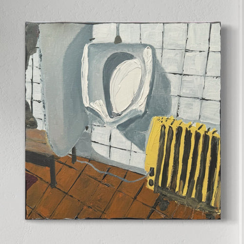 Baño con radiador amarillo